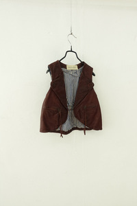 BALCONY AND BED - leather vest