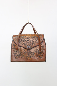 carved leather bag